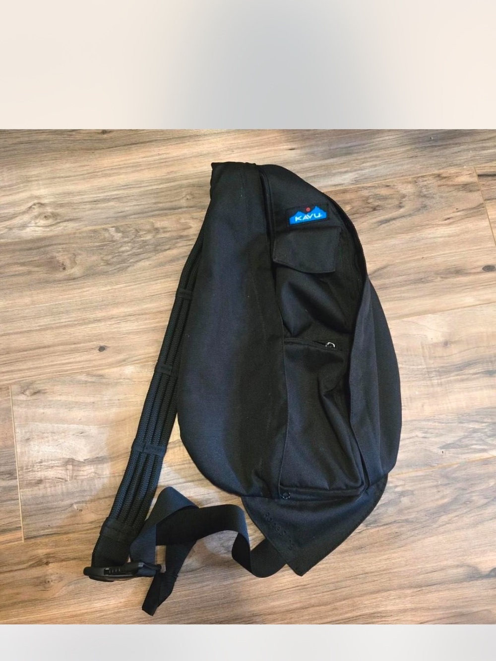 Kavu  solid dark Black Sling with Adjustable Strap and new wallet. Like new